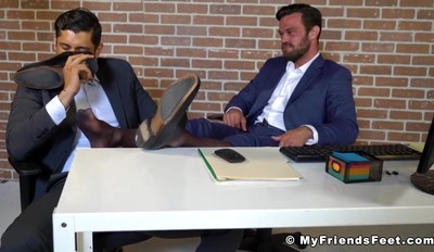 Bearded businessman foot worshipped by kinky Latino stud